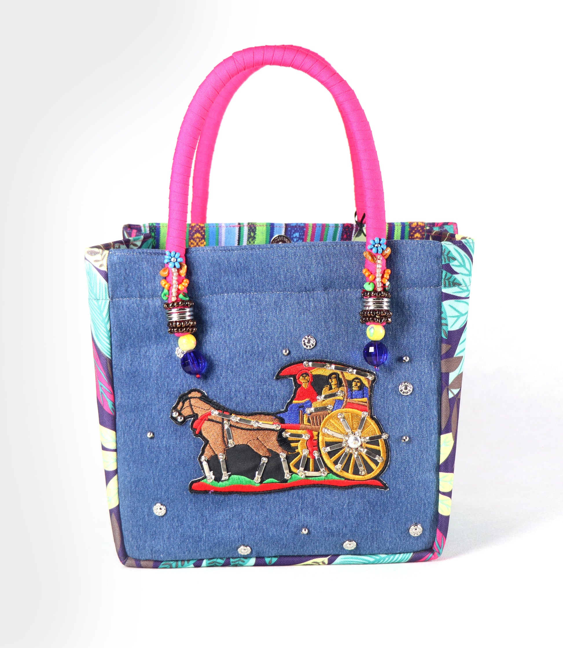 Comes in pink handle, blue denim body, floral patterns on the sides, and a colorful stripe at the back.