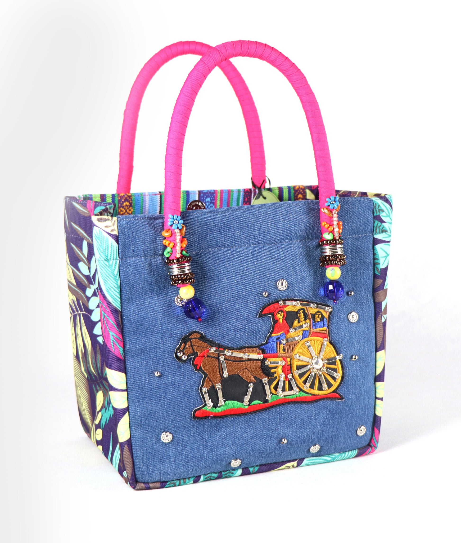 Comes in pink handle, blue denim body, floral patterns on the sides, and a colorful stripe at the back.