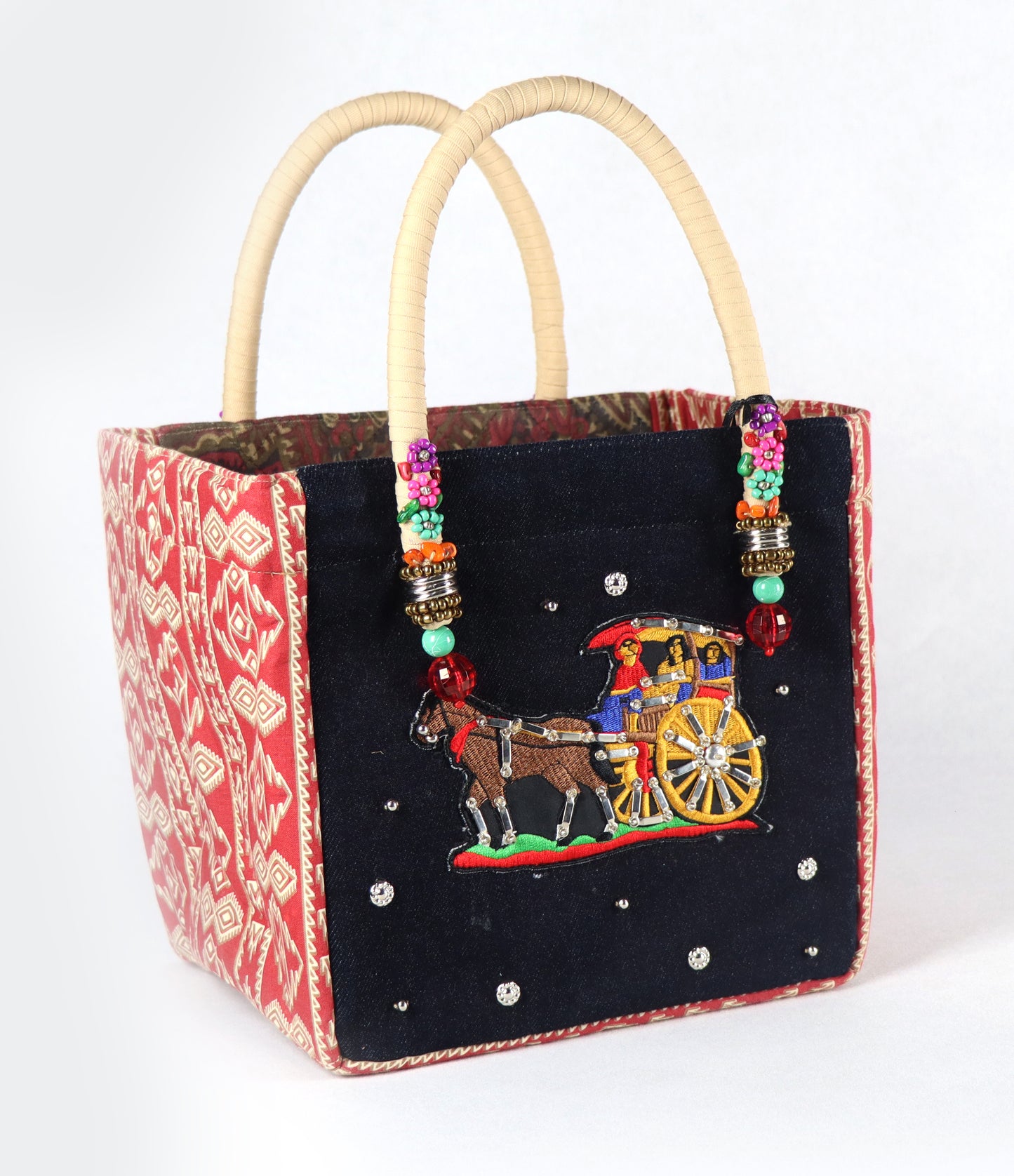 Comes in cream handle, black denim body, red-cream aztec pattern on the side, and a red-brown antique design on the back.