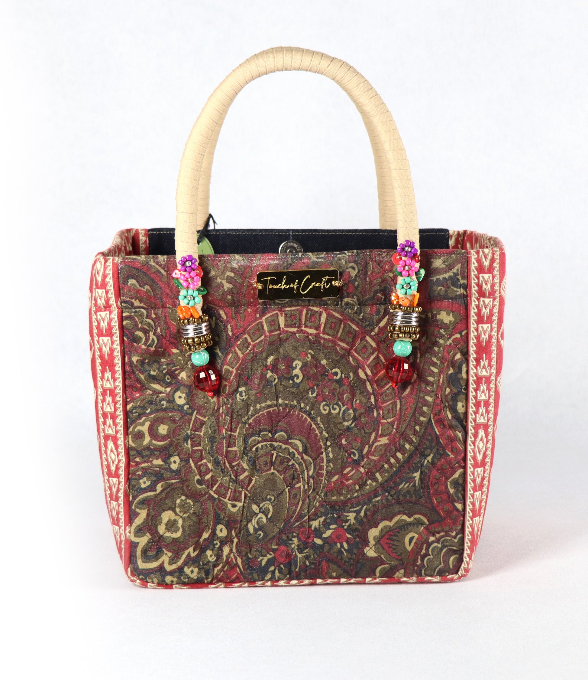 Comes in cream handle, black denim body, red-cream aztec pattern on the side, and a red-brown antique design on the back.