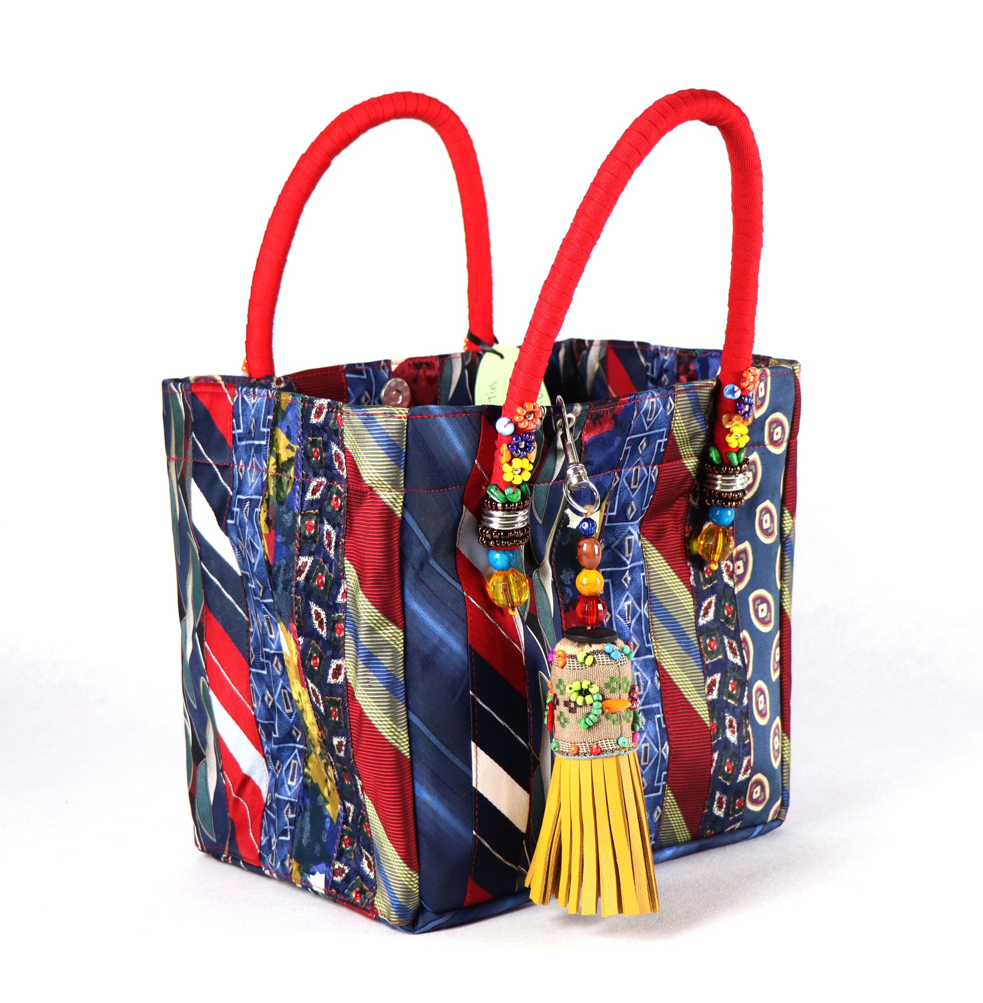 Goes in red handle, yellow tassel, and a range of blue to red ties for the body.